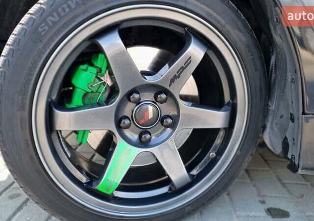 Чорний Мазда 6, об'ємом двигуна 2.26 л та пробігом 218 тис. км за 6800 $, фото 25 на Automoto.ua