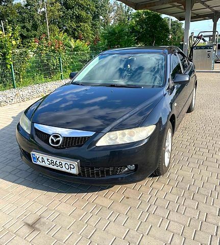 Черный Мазда 6, объемом двигателя 2 л и пробегом 316 тыс. км за 4000 $, фото 4 на Automoto.ua