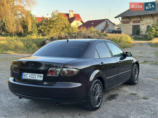 Черный Мазда 6, объемом двигателя 2.3 л и пробегом 220 тыс. км за 3300 $, фото 9 на Automoto.ua