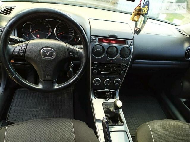 Чорний Мазда 6, об'ємом двигуна 1.8 л та пробігом 211 тис. км за 5200 $, фото 7 на Automoto.ua