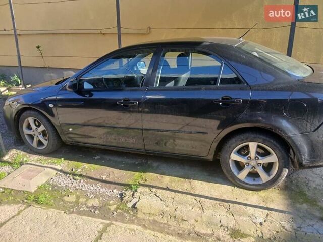 Чорний Мазда 6, об'ємом двигуна 2 л та пробігом 357 тис. км за 2500 $, фото 2 на Automoto.ua