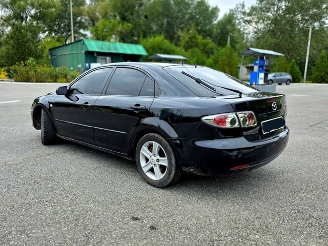 Чорний Мазда 6, об'ємом двигуна 2 л та пробігом 270 тис. км за 4100 $, фото 2 на Automoto.ua
