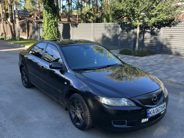 Черный Мазда 6, объемом двигателя 2 л и пробегом 275 тыс. км за 5200 $, фото 1 на Automoto.ua