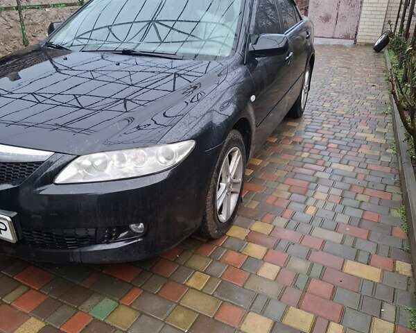 Черный Мазда 6, объемом двигателя 2 л и пробегом 183 тыс. км за 4000 $, фото 7 на Automoto.ua