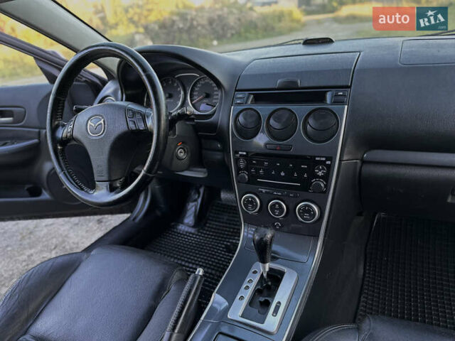 Черный Мазда 6, объемом двигателя 2.3 л и пробегом 220 тыс. км за 3300 $, фото 30 на Automoto.ua