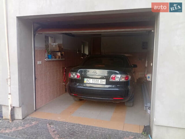 Чорний Мазда 6, об'ємом двигуна 1.8 л та пробігом 308 тис. км за 4599 $, фото 41 на Automoto.ua