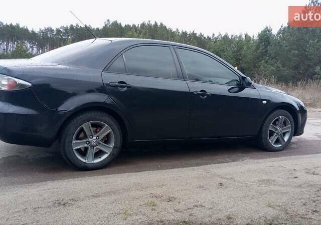 Черный Мазда 6, объемом двигателя 2 л и пробегом 352 тыс. км за 4500 $, фото 5 на Automoto.ua