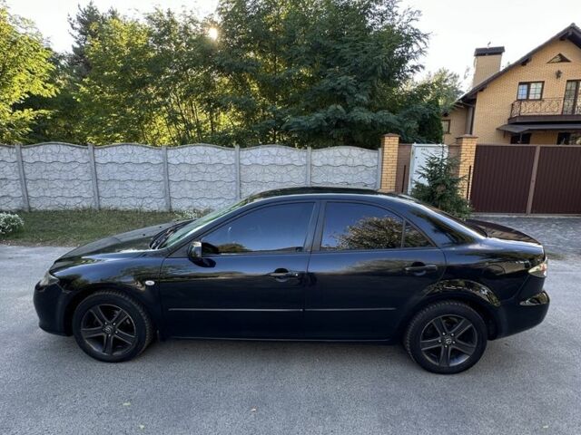 Черный Мазда 6, объемом двигателя 2 л и пробегом 275 тыс. км за 5200 $, фото 5 на Automoto.ua