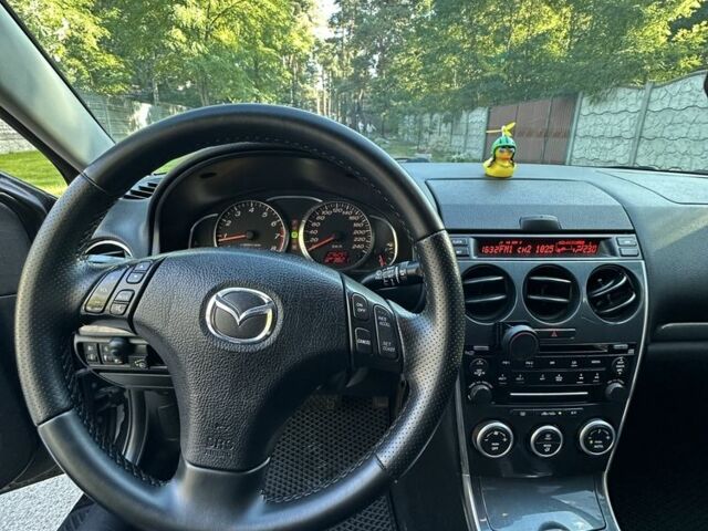 Черный Мазда 6, объемом двигателя 2 л и пробегом 275 тыс. км за 5200 $, фото 6 на Automoto.ua