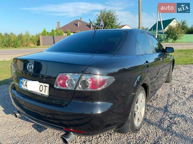 Черный Мазда 6, объемом двигателя 2 л и пробегом 338 тыс. км за 4500 $, фото 12 на Automoto.ua