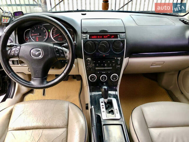 Черный Мазда 6, объемом двигателя 2 л и пробегом 320 тыс. км за 5350 $, фото 5 на Automoto.ua