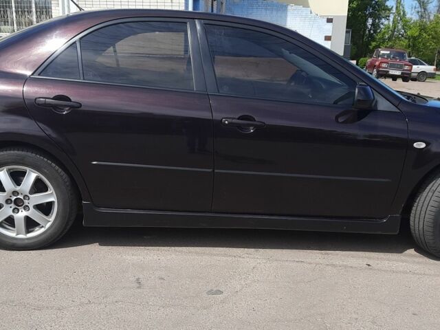 Черный Мазда 6, объемом двигателя 2 л и пробегом 199 тыс. км за 4600 $, фото 10 на Automoto.ua