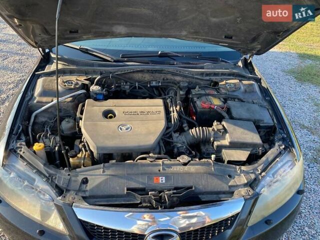 Черный Мазда 6, объемом двигателя 2 л и пробегом 338 тыс. км за 4500 $, фото 26 на Automoto.ua
