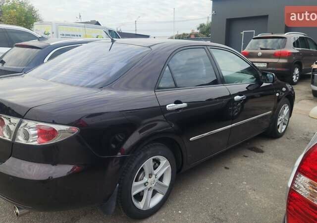 Чорний Мазда 6, об'ємом двигуна 2 л та пробігом 238 тис. км за 4900 $, фото 7 на Automoto.ua