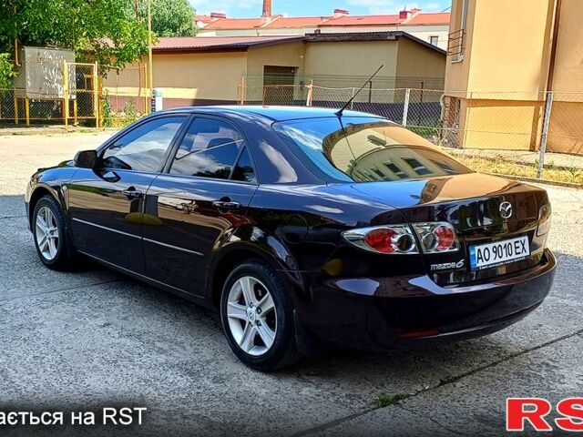Черный Мазда 6, объемом двигателя 1.8 л и пробегом 300 тыс. км за 4700 $, фото 4 на Automoto.ua