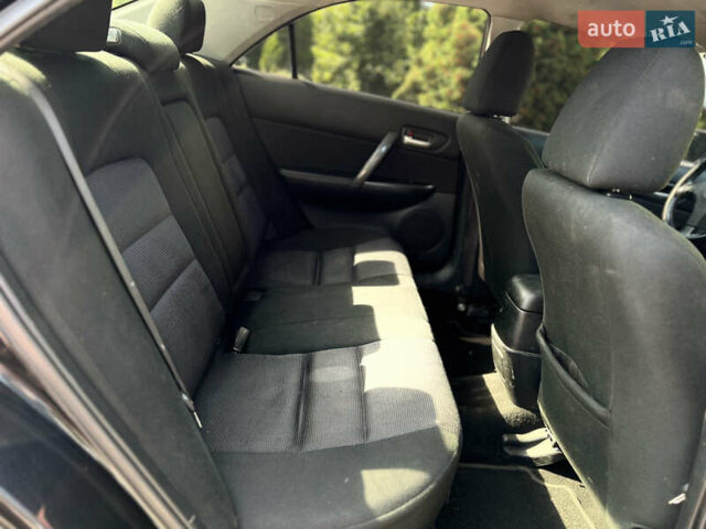 Чорний Мазда 6, об'ємом двигуна 1.8 л та пробігом 308 тис. км за 4599 $, фото 29 на Automoto.ua