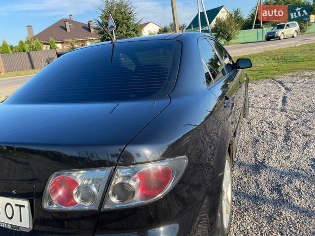 Черный Мазда 6, объемом двигателя 2 л и пробегом 338 тыс. км за 4500 $, фото 9 на Automoto.ua