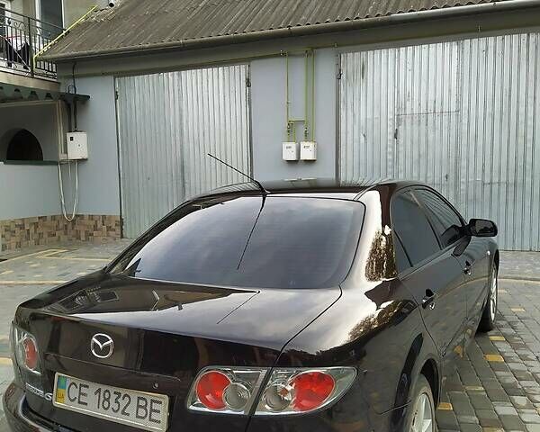 Чорний Мазда 6, об'ємом двигуна 1.8 л та пробігом 211 тис. км за 5200 $, фото 8 на Automoto.ua