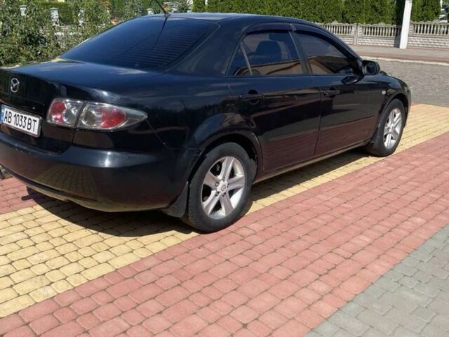 Черный Мазда 6, объемом двигателя 2 л и пробегом 250 тыс. км за 2100 $, фото 4 на Automoto.ua