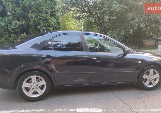 Чорний Мазда 6, об'ємом двигуна 2 л та пробігом 273 тис. км за 5000 $, фото 14 на Automoto.ua