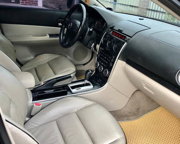 Черный Мазда 6, объемом двигателя 2 л и пробегом 320 тыс. км за 5350 $, фото 8 на Automoto.ua