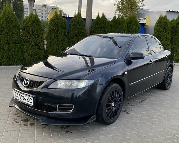 Черный Мазда 6, объемом двигателя 2 л и пробегом 320 тыс. км за 5350 $, фото 3 на Automoto.ua