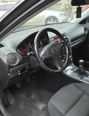 Черный Мазда 6, объемом двигателя 2 л и пробегом 266 тыс. км за 5200 $, фото 16 на Automoto.ua