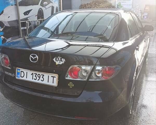 Черный Мазда 6, объемом двигателя 2 л и пробегом 238 тыс. км за 6200 $, фото 4 на Automoto.ua
