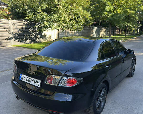 Черный Мазда 6, объемом двигателя 2 л и пробегом 276 тыс. км за 4800 $, фото 4 на Automoto.ua