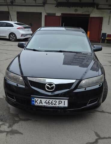 Черный Мазда 6, объемом двигателя 2 л и пробегом 266 тыс. км за 5200 $, фото 1 на Automoto.ua