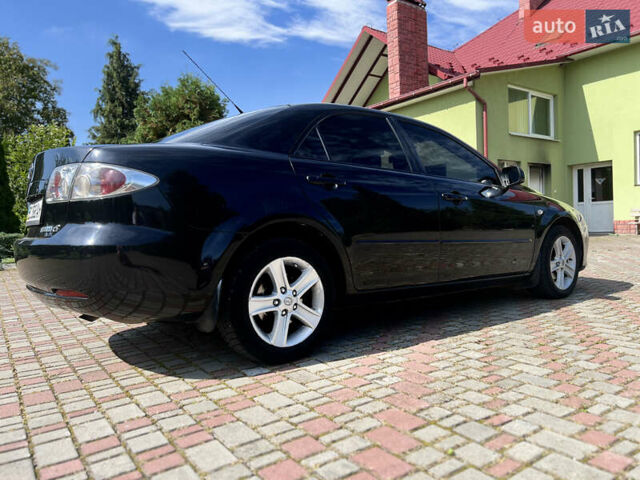 Чорний Мазда 6, об'ємом двигуна 1.8 л та пробігом 308 тис. км за 4599 $, фото 5 на Automoto.ua