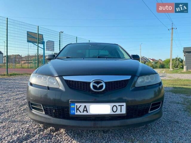 Черный Мазда 6, объемом двигателя 2 л и пробегом 338 тыс. км за 4500 $, фото 3 на Automoto.ua