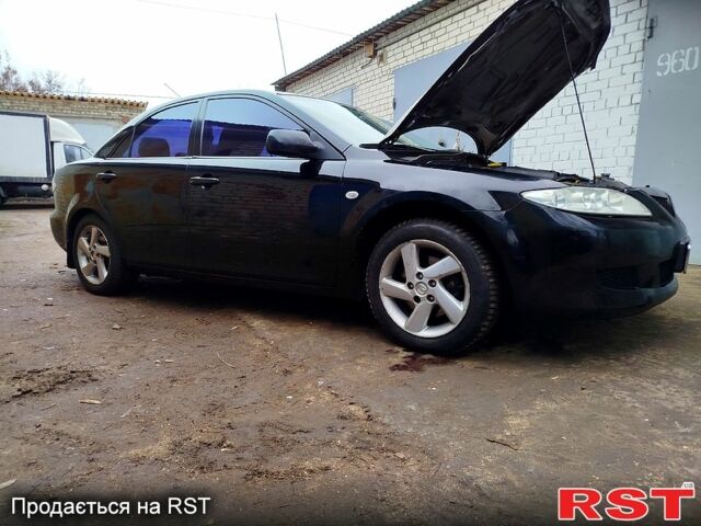 Черный Мазда 6, объемом двигателя 20 л и пробегом 234 тыс. км за 5500 $, фото 5 на Automoto.ua