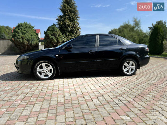 Чорний Мазда 6, об'ємом двигуна 1.8 л та пробігом 308 тис. км за 4599 $, фото 2 на Automoto.ua