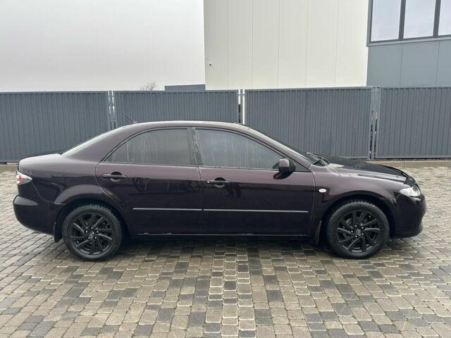 Черный Мазда 6, объемом двигателя 1.8 л и пробегом 315 тыс. км за 4499 $, фото 1 на Automoto.ua