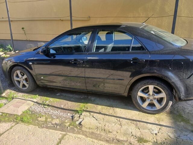 Чорний Мазда 6, об'ємом двигуна 2 л та пробігом 358 тис. км за 2500 $, фото 1 на Automoto.ua