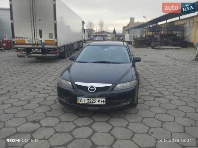 Черный Мазда 6, объемом двигателя 2 л и пробегом 268 тыс. км за 6300 $, фото 1 на Automoto.ua