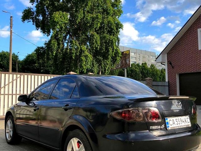 Черный Мазда 6, объемом двигателя 2 л и пробегом 320 тыс. км за 5350 $, фото 7 на Automoto.ua