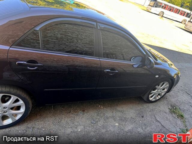 Черный Мазда 6, объемом двигателя 2 л и пробегом 260 тыс. км за 5500 $, фото 6 на Automoto.ua