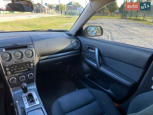 Черный Мазда 6, объемом двигателя 2 л и пробегом 338 тыс. км за 4500 $, фото 19 на Automoto.ua