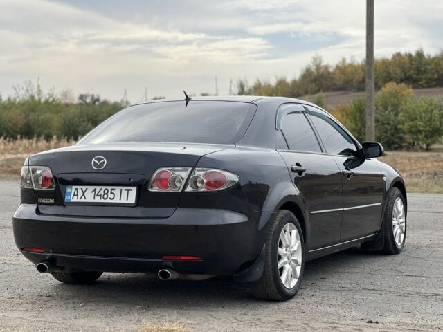 Черный Мазда 6, объемом двигателя 2 л и пробегом 266 тыс. км за 4950 $, фото 3 на Automoto.ua