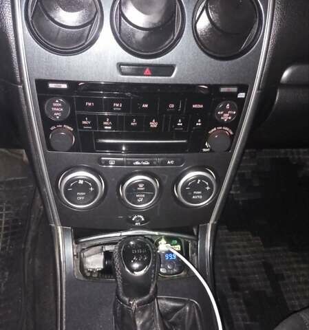 Черный Мазда 6, объемом двигателя 2 л и пробегом 352 тыс. км за 4500 $, фото 4 на Automoto.ua