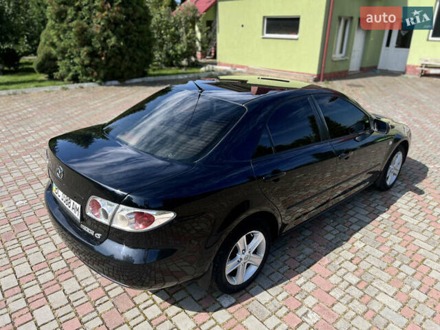Чорний Мазда 6, об'ємом двигуна 1.8 л та пробігом 308 тис. км за 4599 $, фото 11 на Automoto.ua
