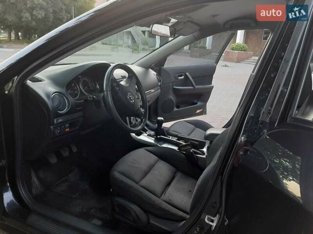 Черный Мазда 6, объемом двигателя 2 л и пробегом 268 тыс. км за 6300 $, фото 7 на Automoto.ua