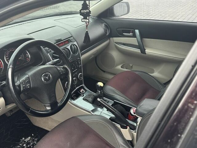 Черный Мазда 6, объемом двигателя 1.8 л и пробегом 315 тыс. км за 4499 $, фото 4 на Automoto.ua