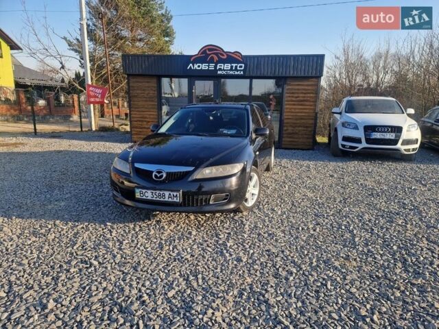 Чорний Мазда 6, об'ємом двигуна 1.8 л та пробігом 311 тис. км за 4499 $, фото 2 на Automoto.ua