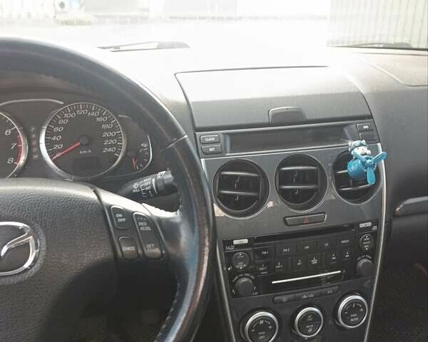 Черный Мазда 6, объемом двигателя 2 л и пробегом 238 тыс. км за 6200 $, фото 2 на Automoto.ua