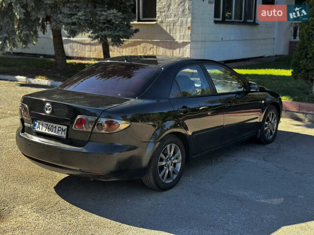Чорний Мазда 6, об'ємом двигуна 1.8 л та пробігом 370 тис. км за 3200 $, фото 10 на Automoto.ua