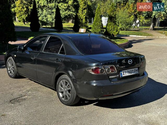 Чорний Мазда 6, об'ємом двигуна 1.8 л та пробігом 370 тис. км за 3200 $, фото 7 на Automoto.ua