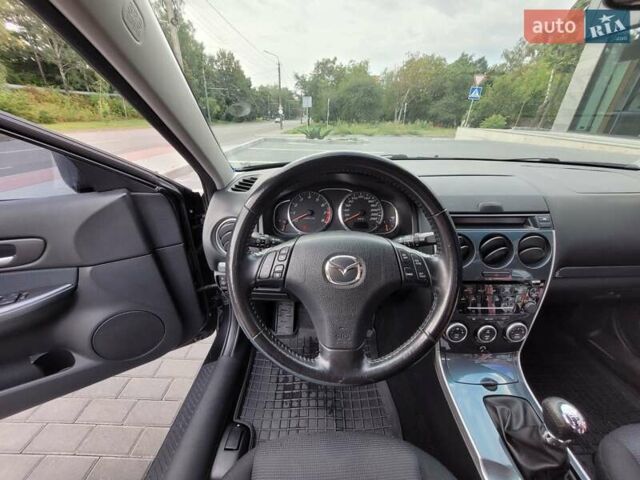 Черный Мазда 6, объемом двигателя 1.8 л и пробегом 278 тыс. км за 3600 $, фото 2 на Automoto.ua